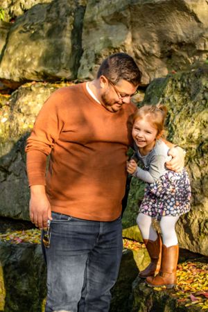 Fall Family session daddy tickling daughter
