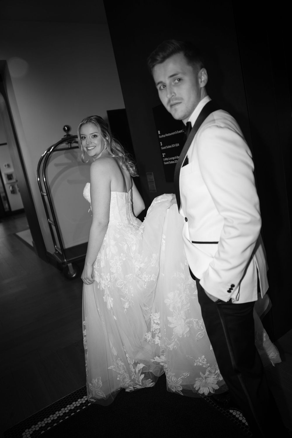 Black and white wedding photos show a couple dancing together in a dimly lit room.