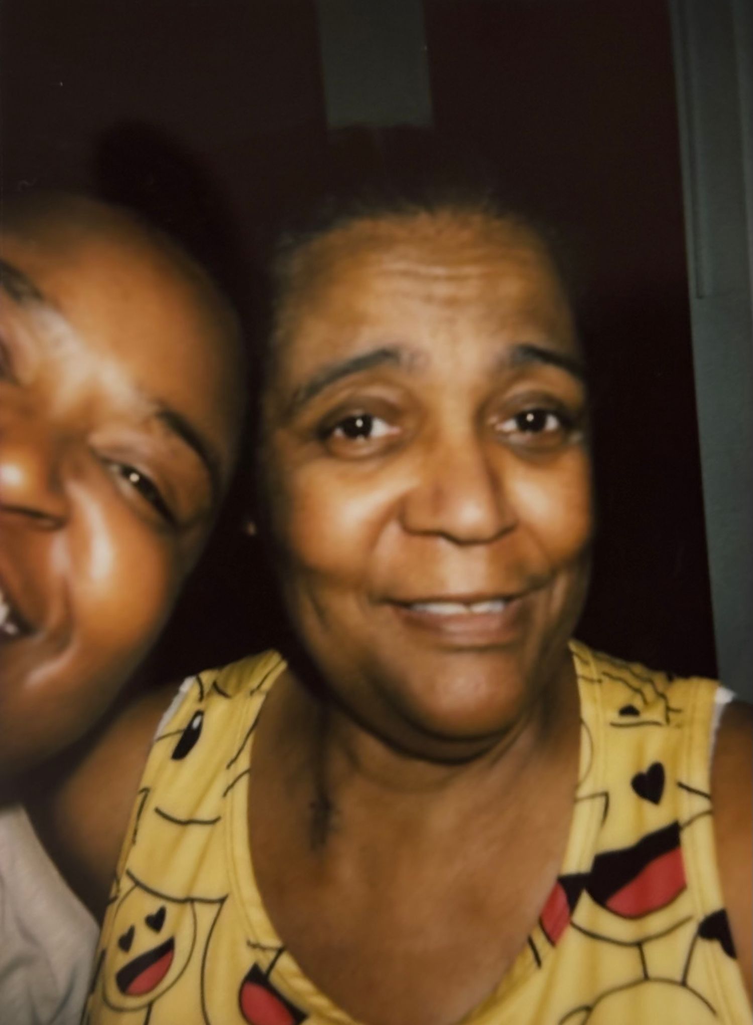 Series of close-up shots showing joyful expressions in dim lighting.