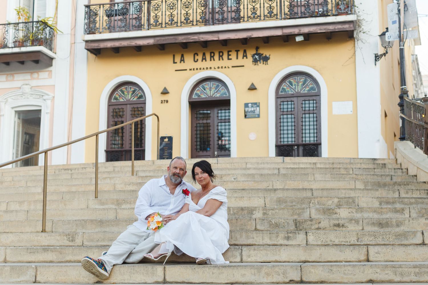 Wedding portrait. Seated on stairs in Old San Juan, Puerto Rico.