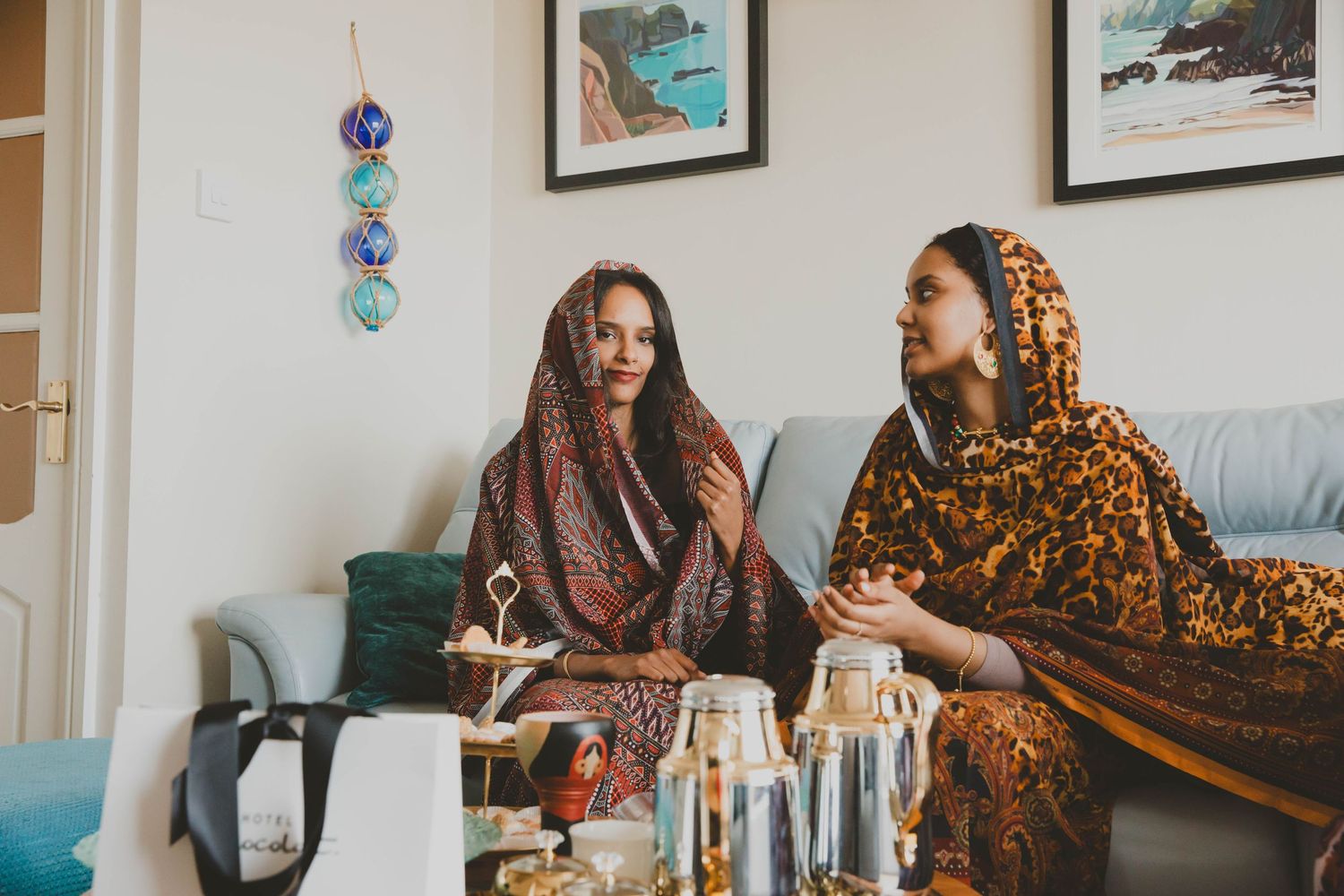 Sudanese/Welsh sister Models wearing silk Toub designed by HIMA RAHAMA. NORTH WALES