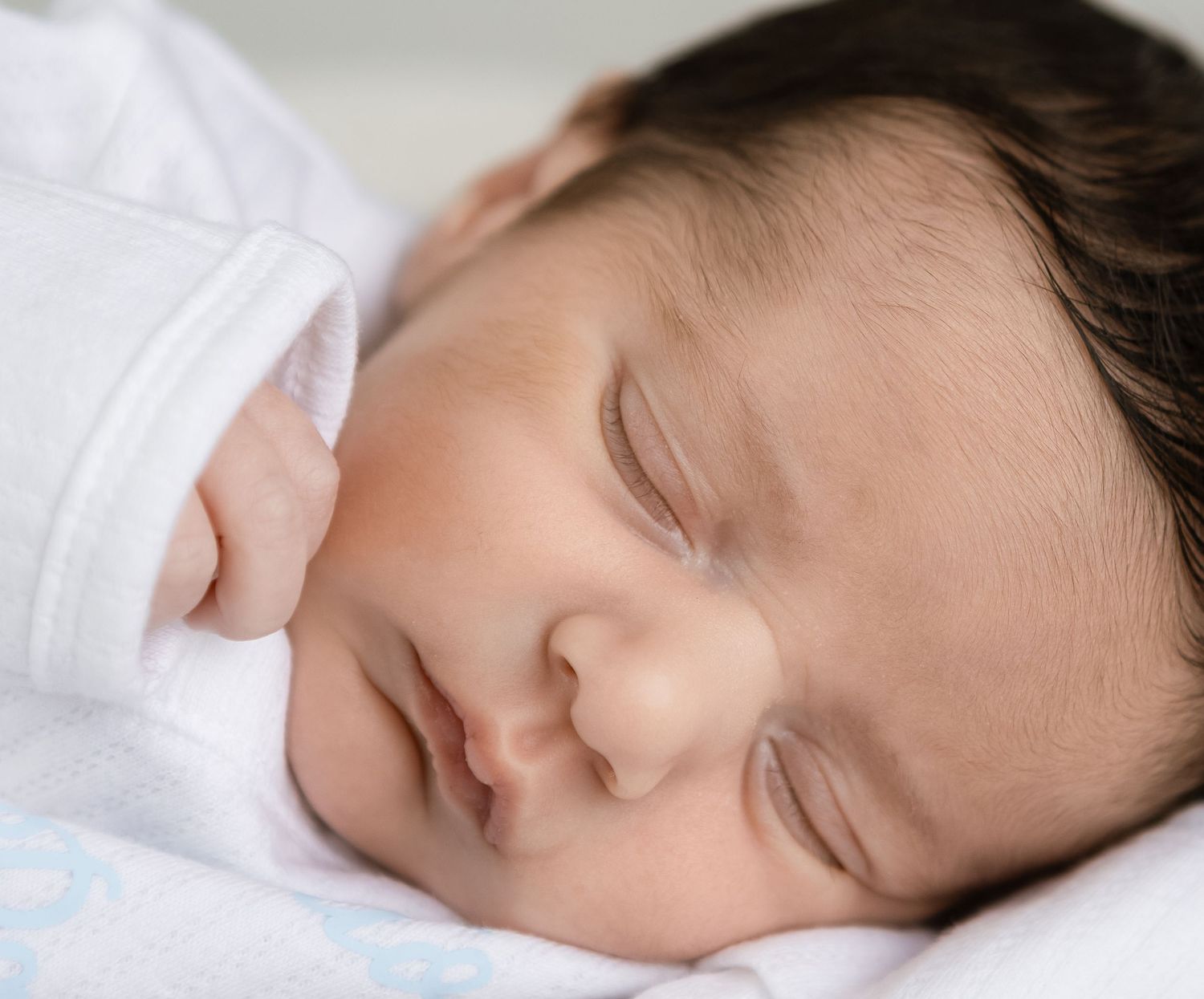 Lincoln, Alabama newborn photographer capturing peaceful, candid moments of a sleeping baby