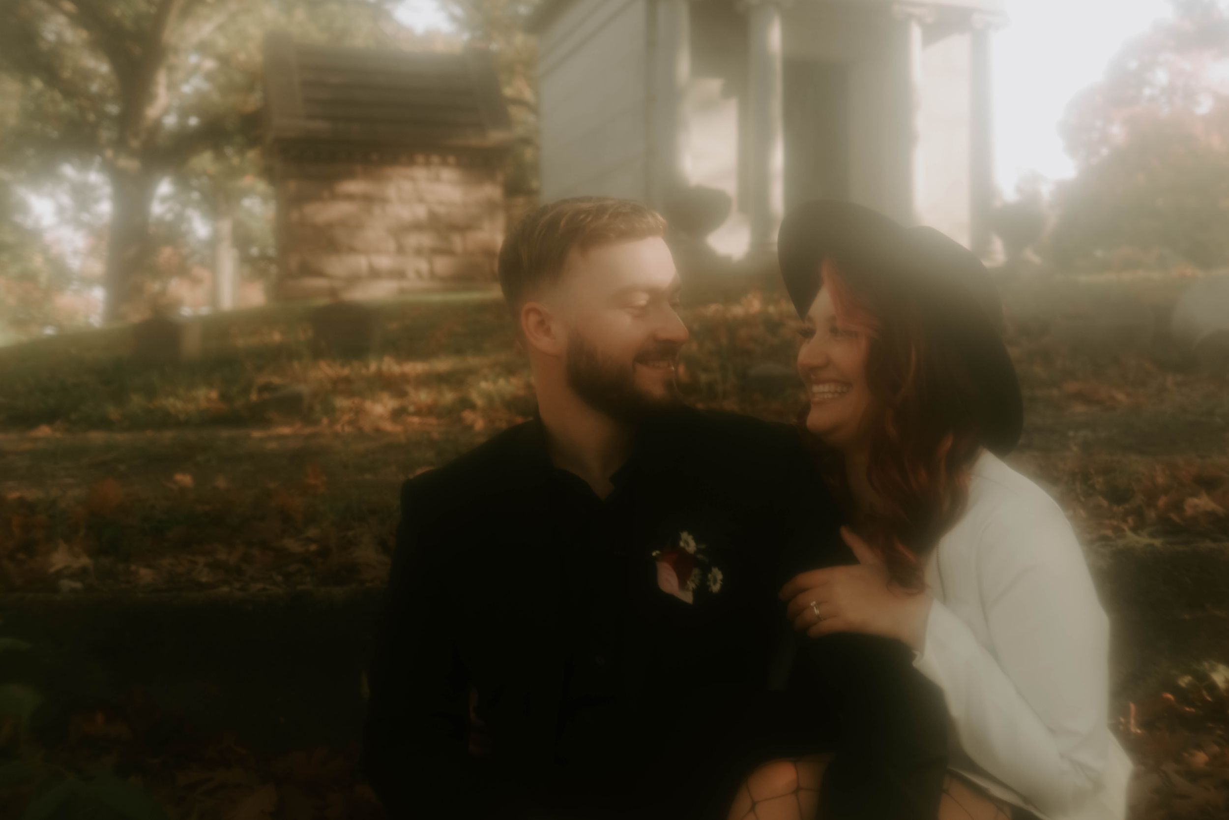 Dreamy sepia-toned photographs showing tender moments between a couple in nature.