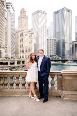 A series of engagement photos with Chicago's iconic riverfront skyline as the backdrop.