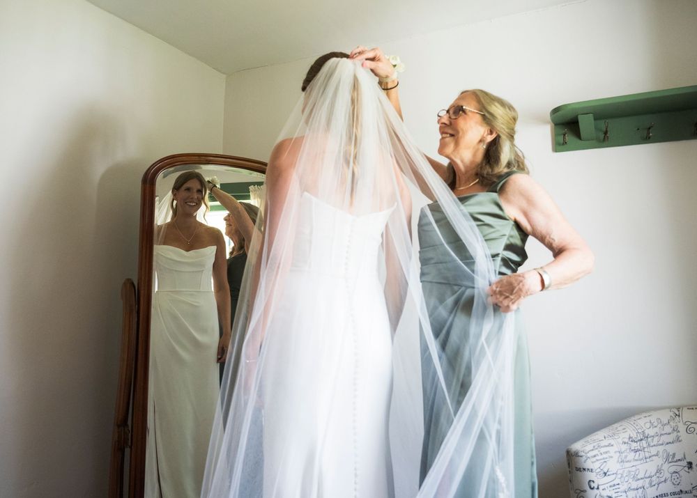 A series of ethereal bridal photos showing flowing white veil movement against a light background.