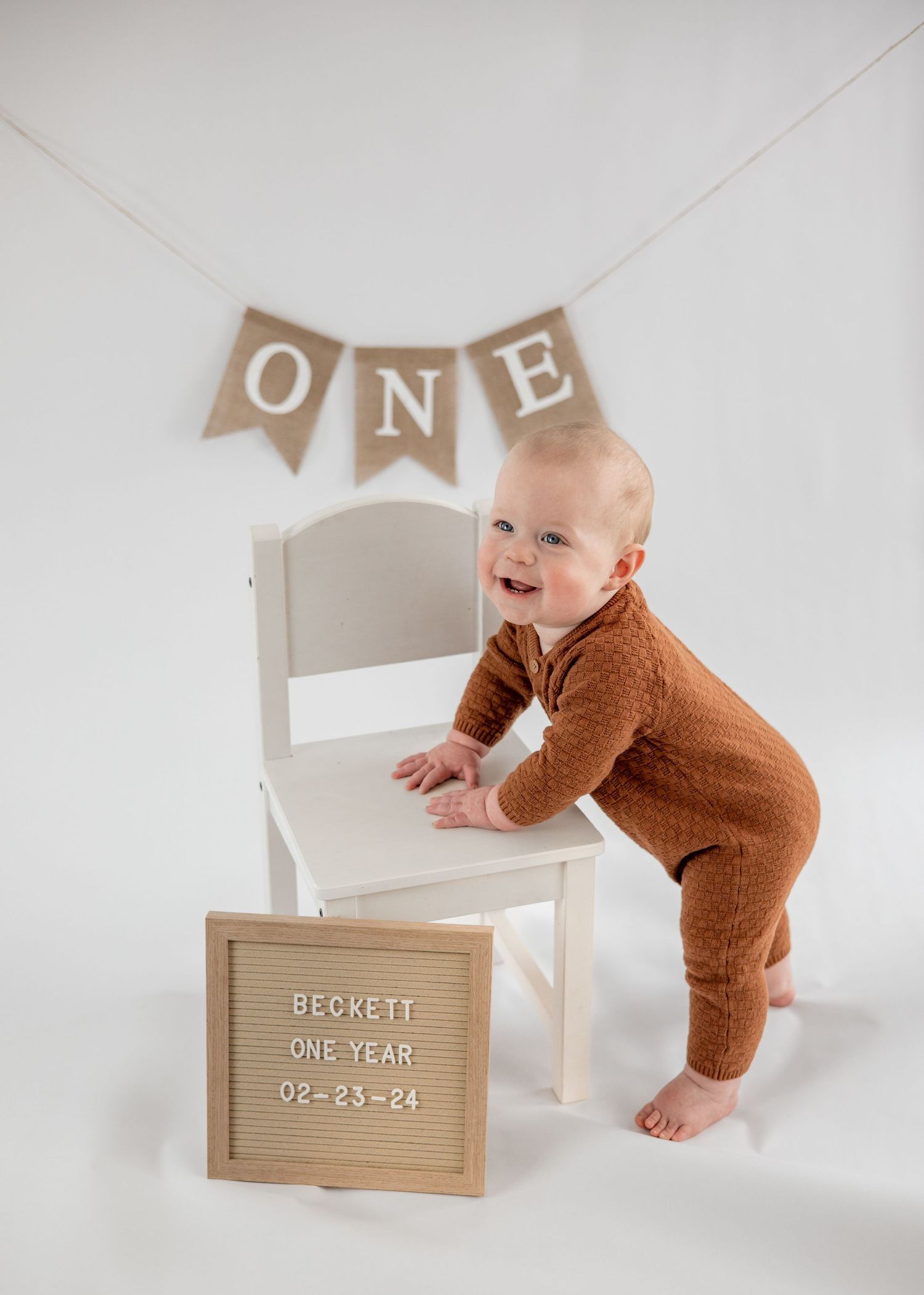 Baby celebrating first birthday with cake smash in Waynesboro, photographed during milestone session.