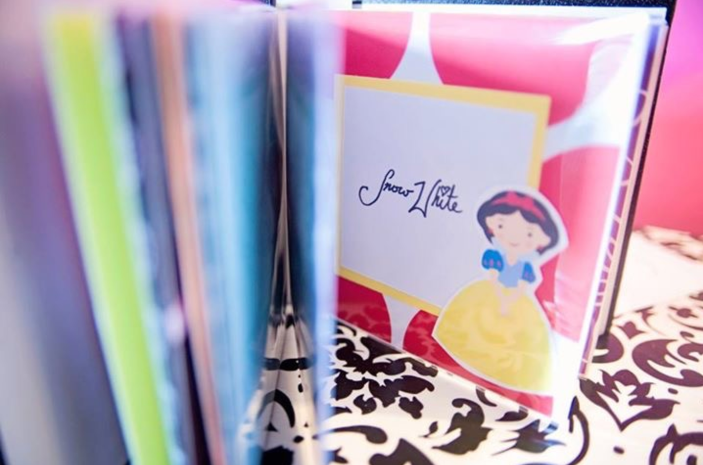 Close-up of colorful pen tips against a blurred background.
