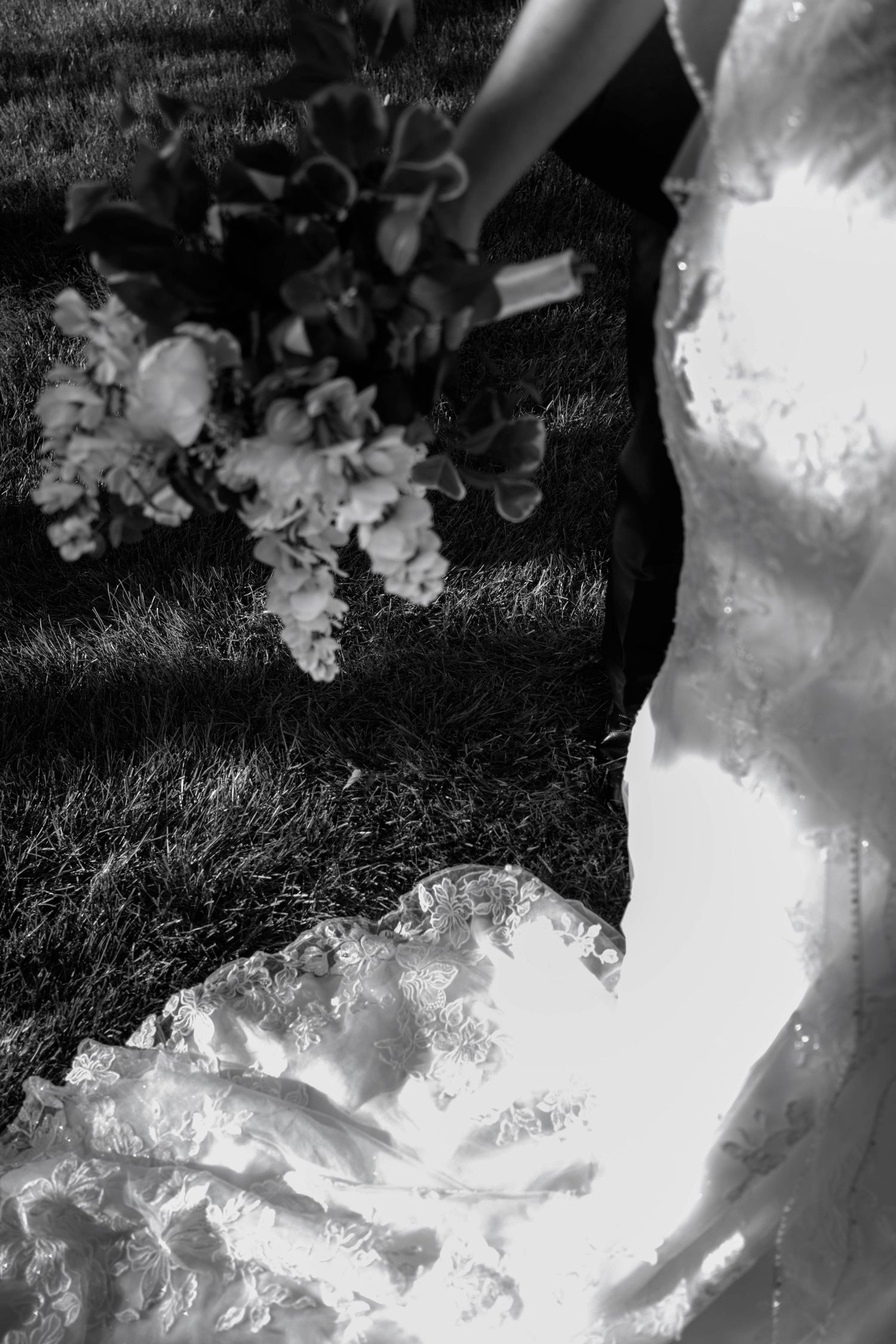Close-up black and white macro shot of delicate crystal mineral formations with intricate branching patterns.