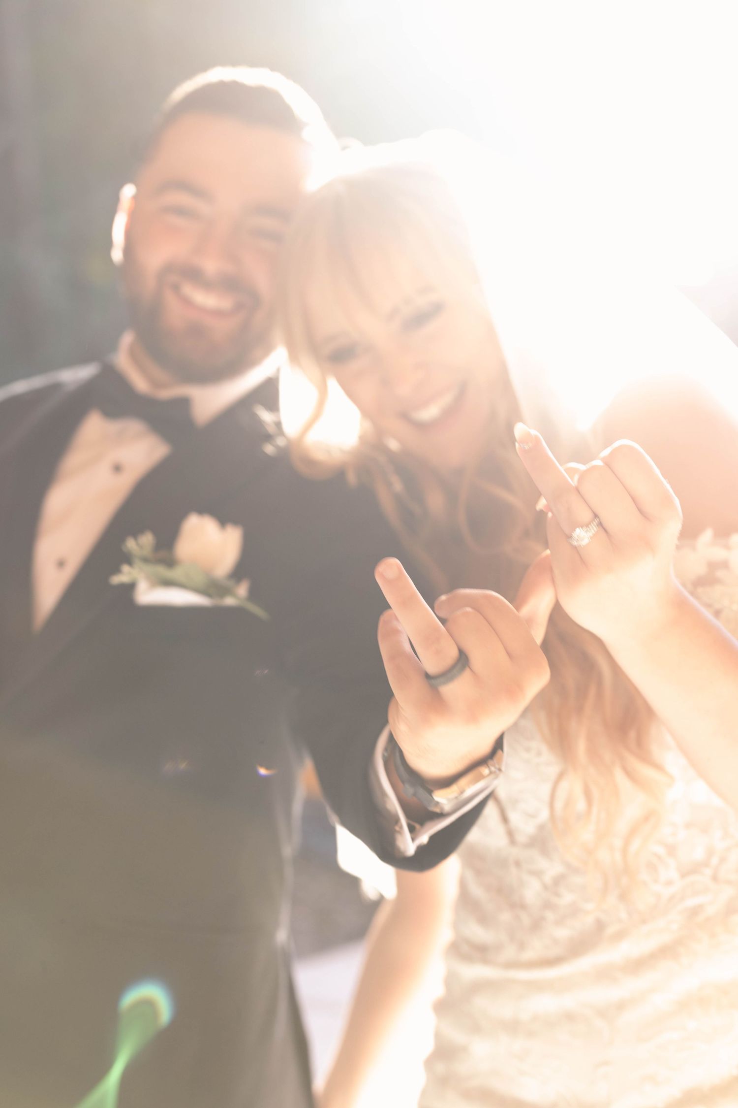 Sunlit wedding portrait series showing joyful couple in formal attire.