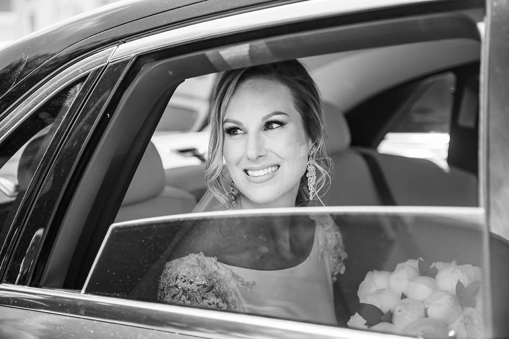 A collection of candid moments captured through a car window on a wedding day.