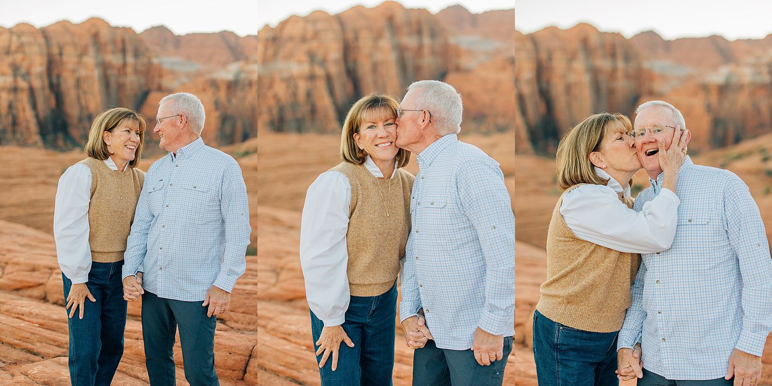 A group enjoys a candid moment while exploring scenic red rock desert landscape at sunset.