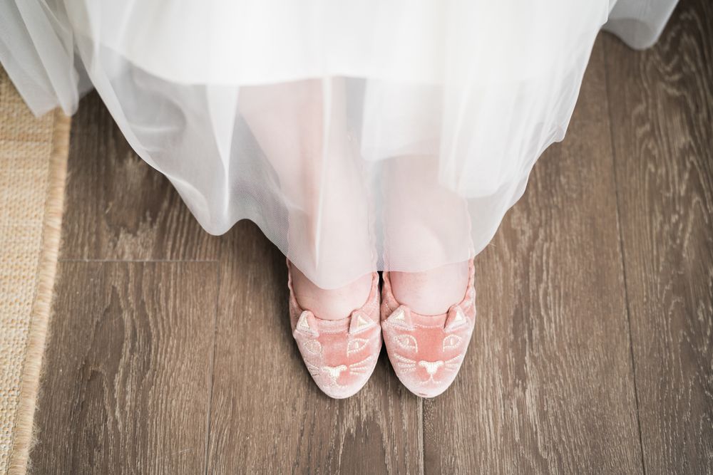 Photo of bride's cat shaped wedding shoes.
