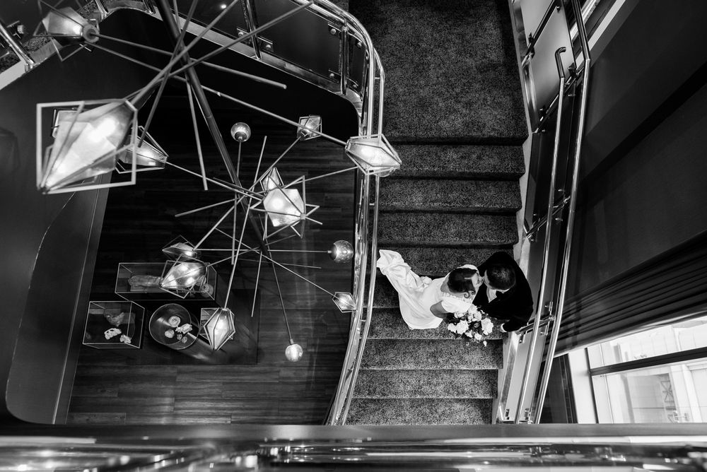 Black and white photo of bride and groom at hotel wedding in Chicago, Illinois.