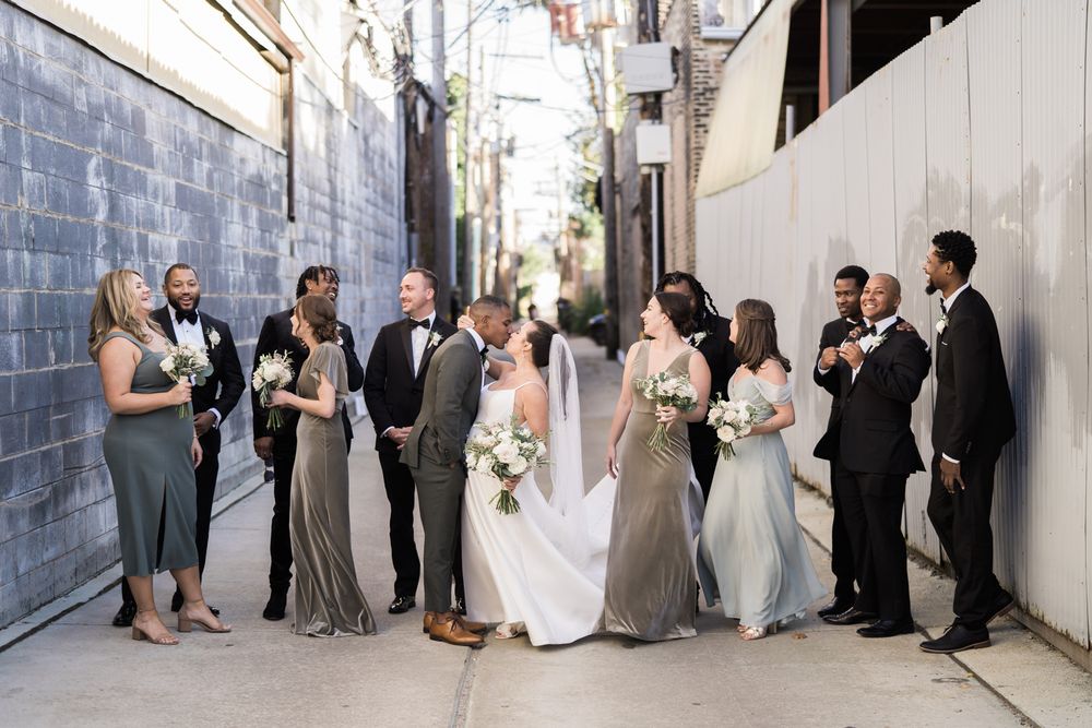 Wedding party portrait in alley at wedding venue The Joinery in Chicago, Illinois.
