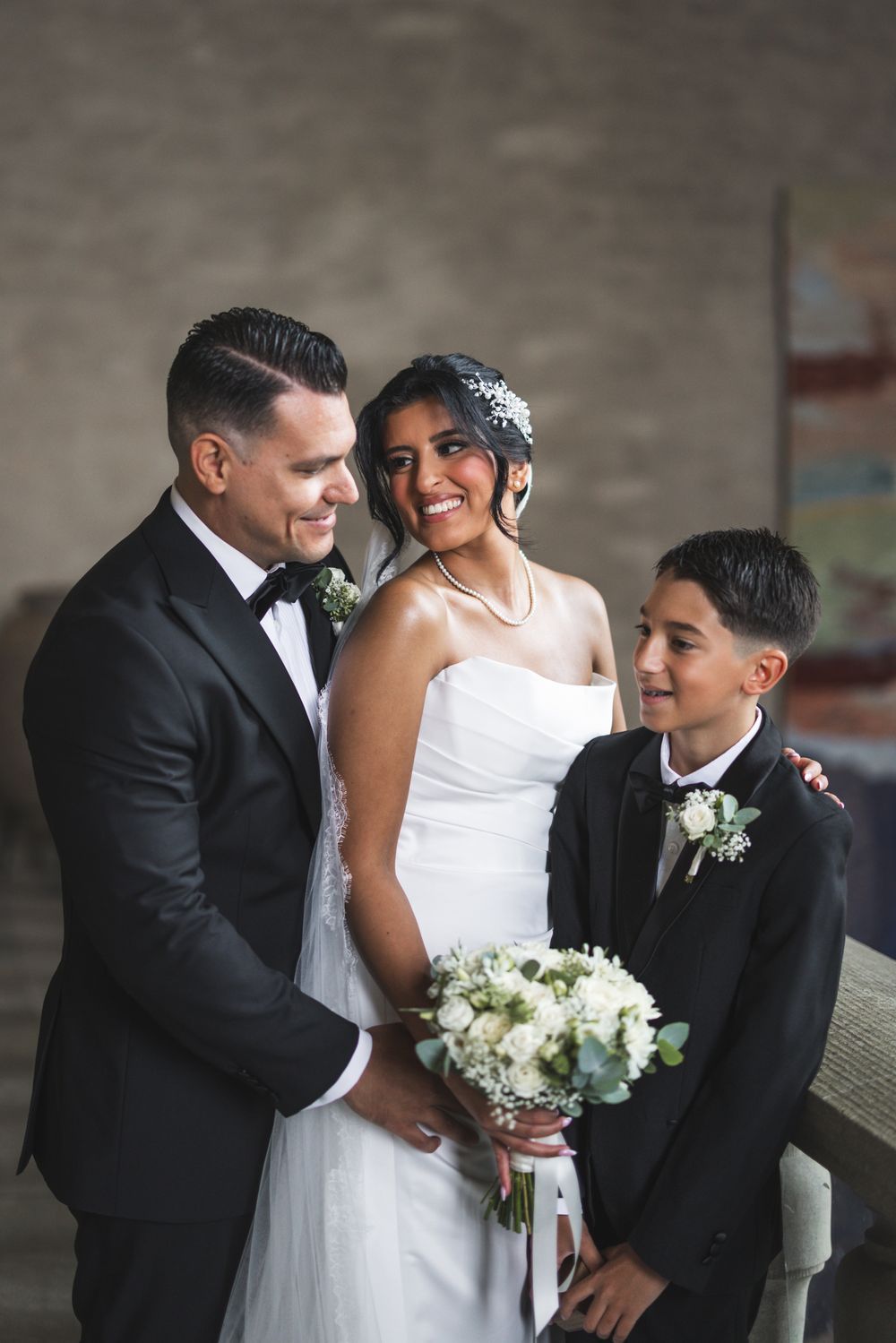 Wedding couple in elegant black and white attire share intimate moments in a series of romantic portraits.