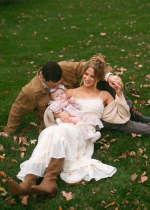 Candid family photos on grass showing playful moments in autumn setting.