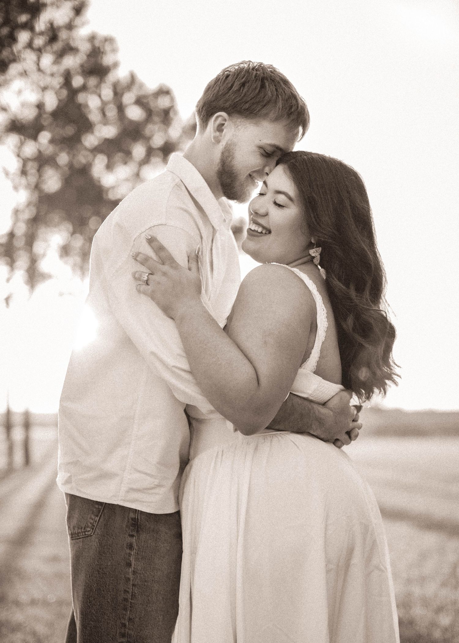 Live Oak, FL photography for couples. A couple enjoying a moment together during a photography session at their wedding venue.