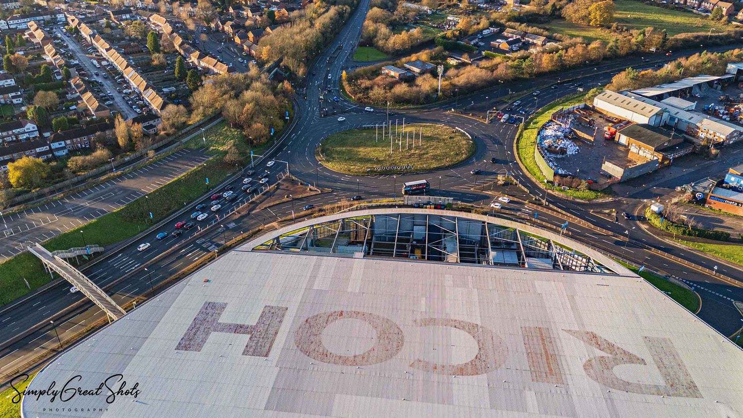 Aerial view of the Coventry Building Society Arena stadium (Home of Coventry City F.C.) near a busy roundabout intersection.
