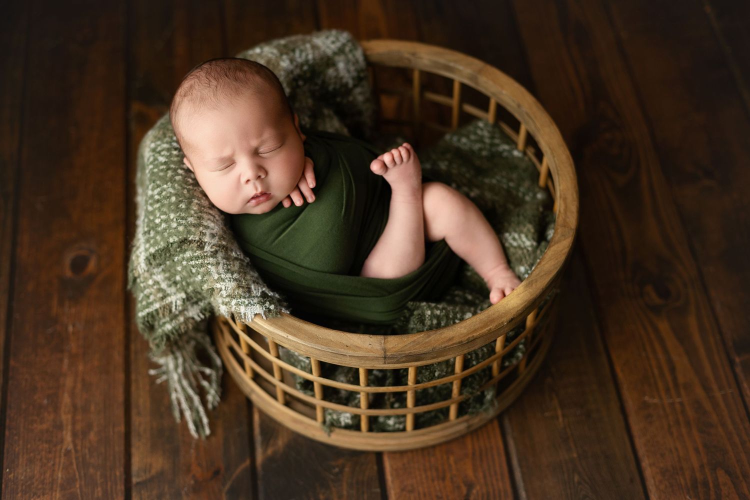 A newborn boy in a green wrap. Greenville SC newborn photographer, Easley, SC newborn photographer
