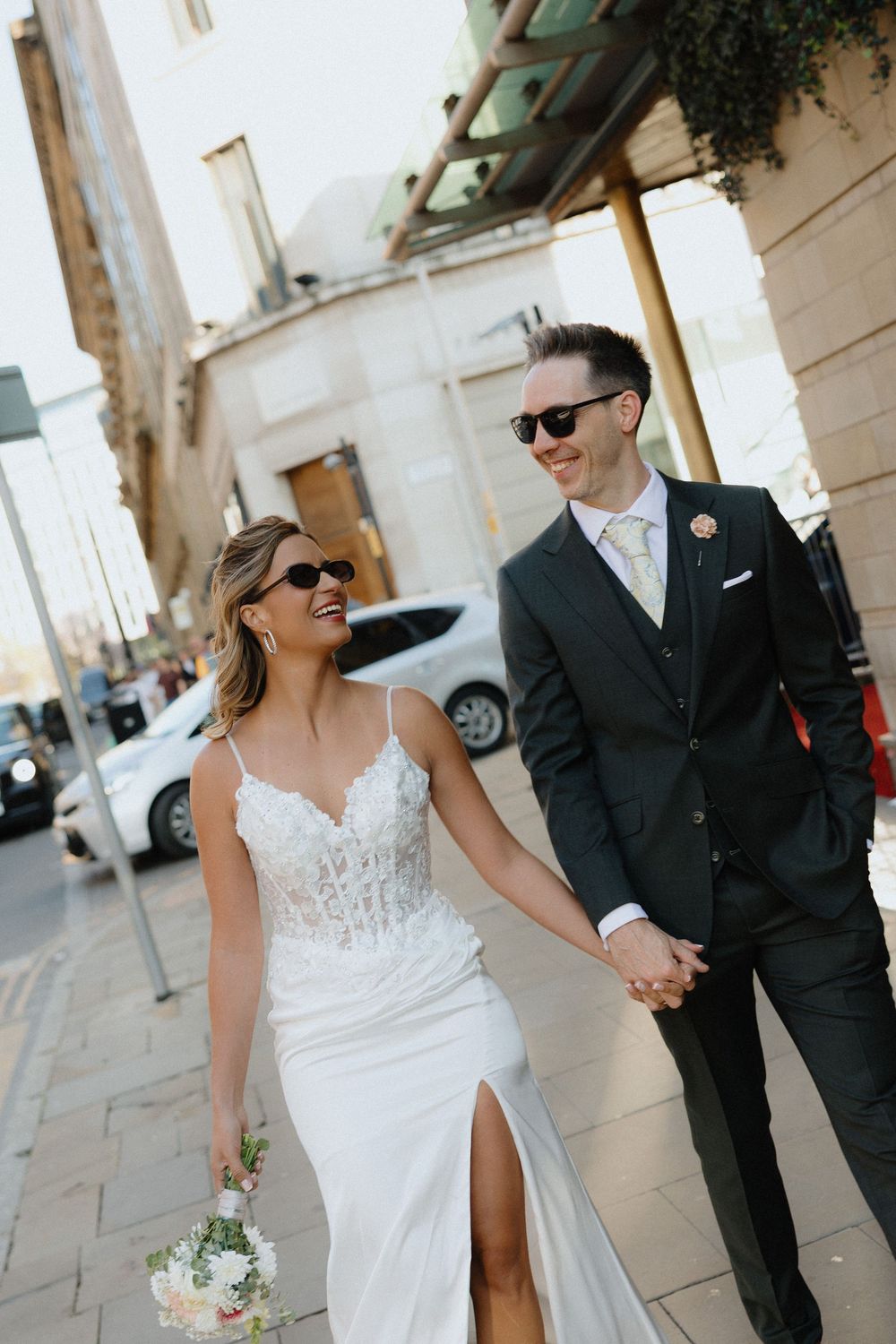 Candid wedding photos of bride and groom in Manchester