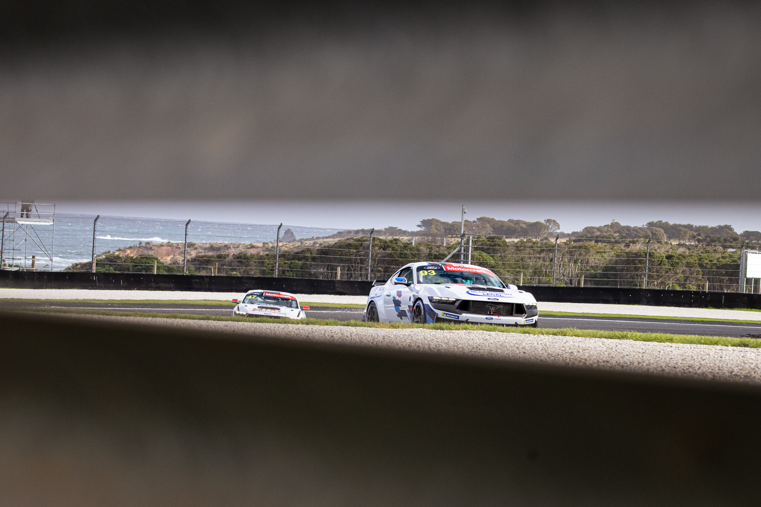 Tyler Everingham speeds by his team-mate.