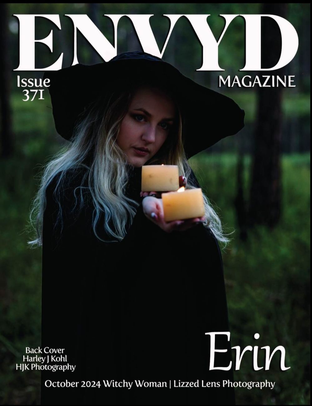 ENVYD Magazine October 2024 cover featuring woman in witch hat holding glowing candles.