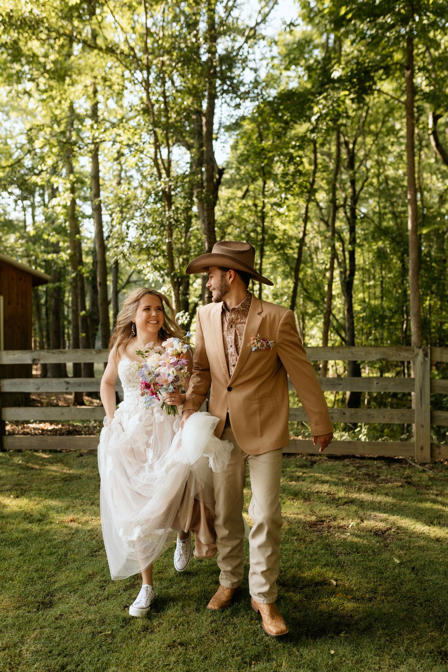 Photograph of bride and groom at the barn at big oak in franklin Georgia