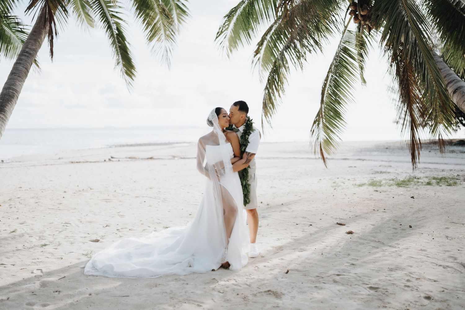 Panoramic view of pristine white sandy beaches and turquoise waters meeting the horizon in a tropical paradise.