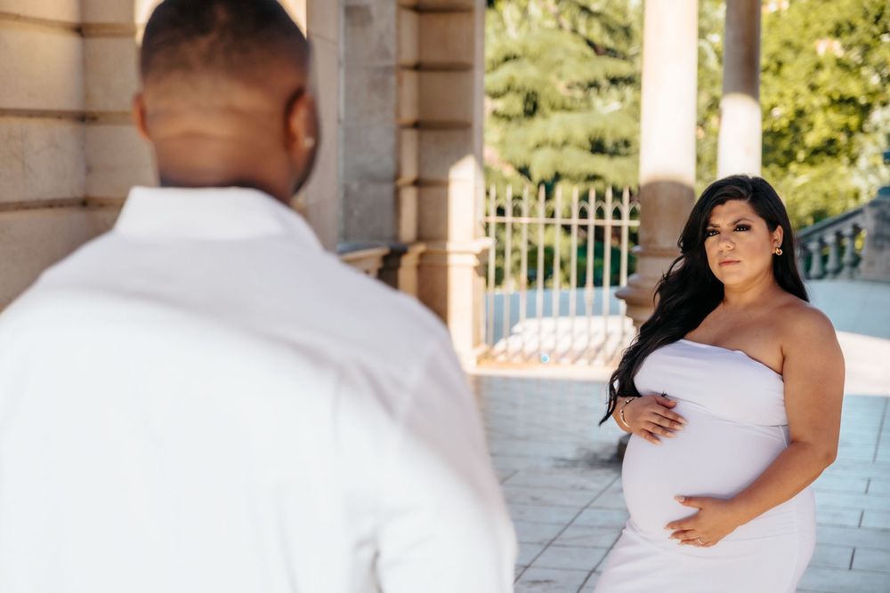Couple celebrating their engagement and baby news in Ciutadella Park.