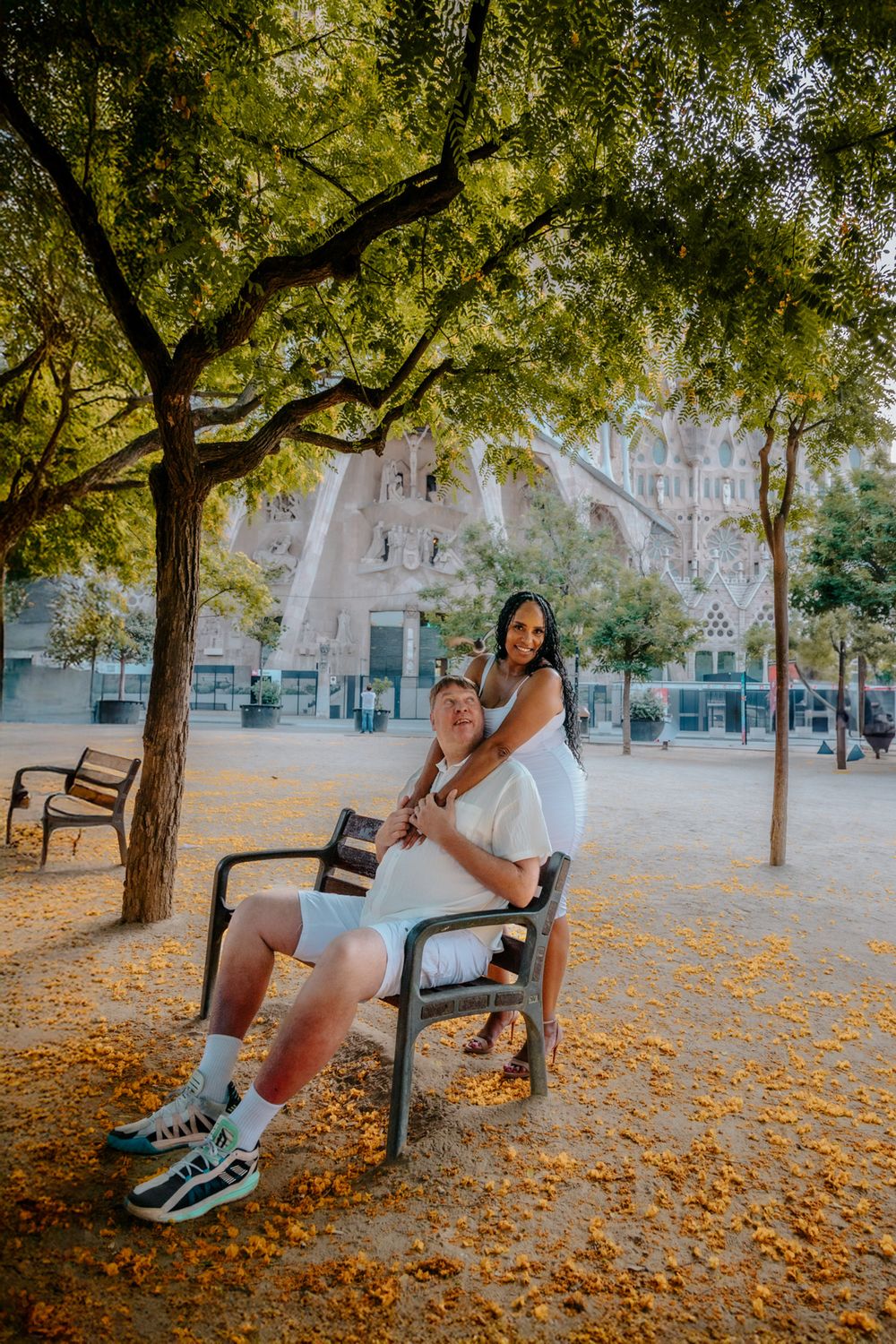 Couple enjoying a quiet moment under the colorful stained glass windows.