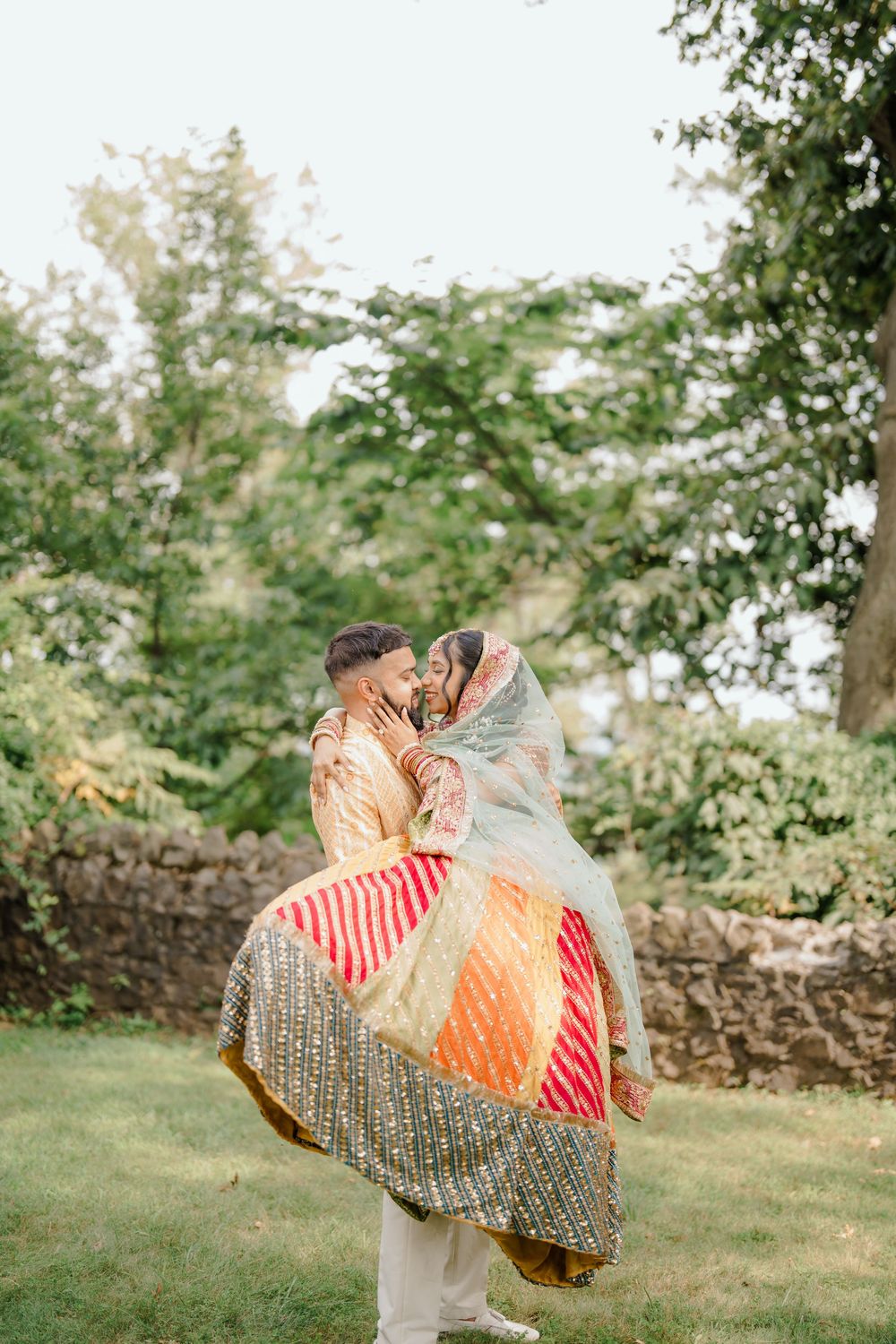 South Asian wedding couple posing during outdoor photoshoot in NJ