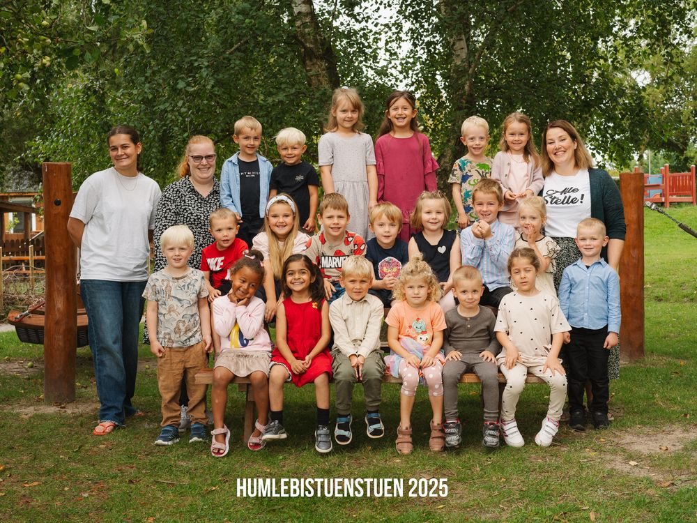 A panoramic collage shows groups of children sitting together outdoors in a park-like setting for an organized photo shoot.