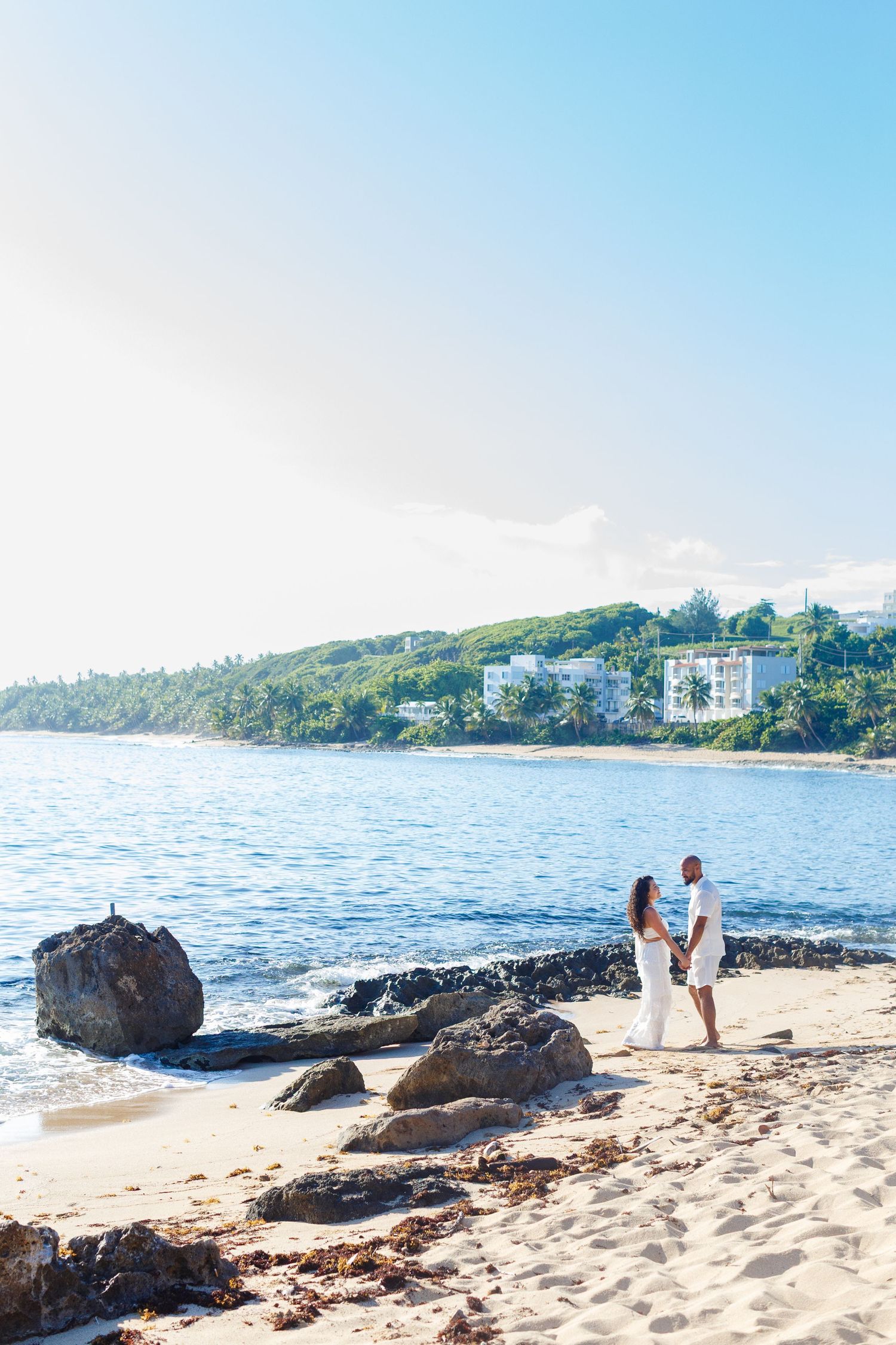 Couples portrait on the beach. Marriage proposal. Playa Mar Chiquita, Puerto Rico.