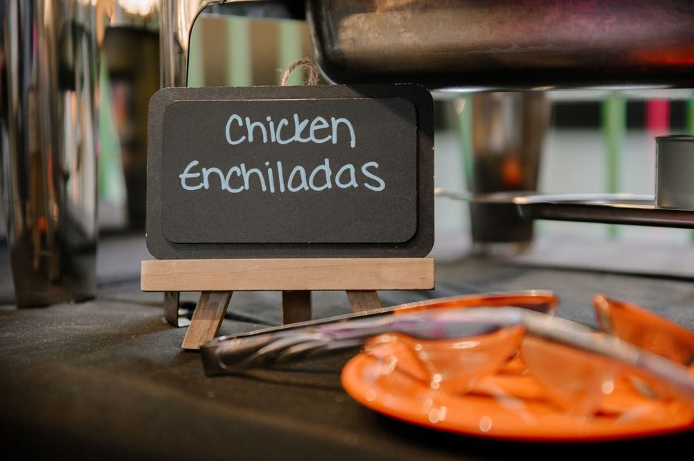 Restaurant menu board and table setting with warm lighting and decorative elements.