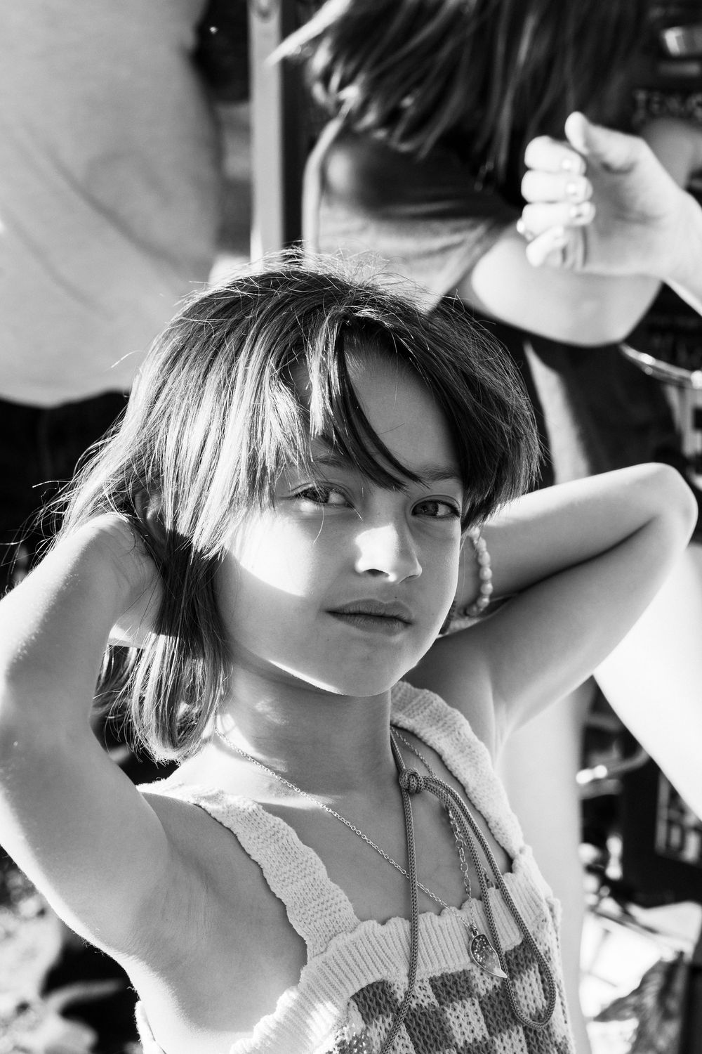 Black and white portrait series showing different angles and expressions.