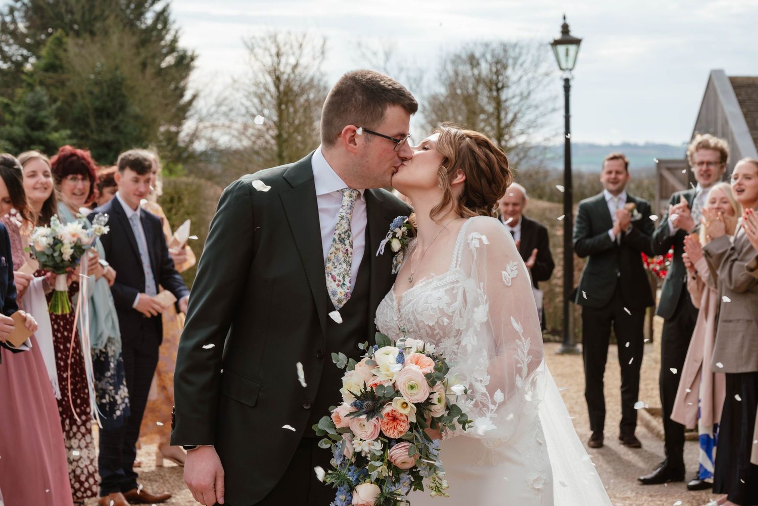 Hyde House Wedding Photographer Cotswolds Zara Davis Photography Gloucestershire Cheltenham confetti in front of house March spring