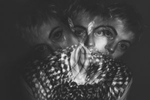 experimental photo of an artist in black and white