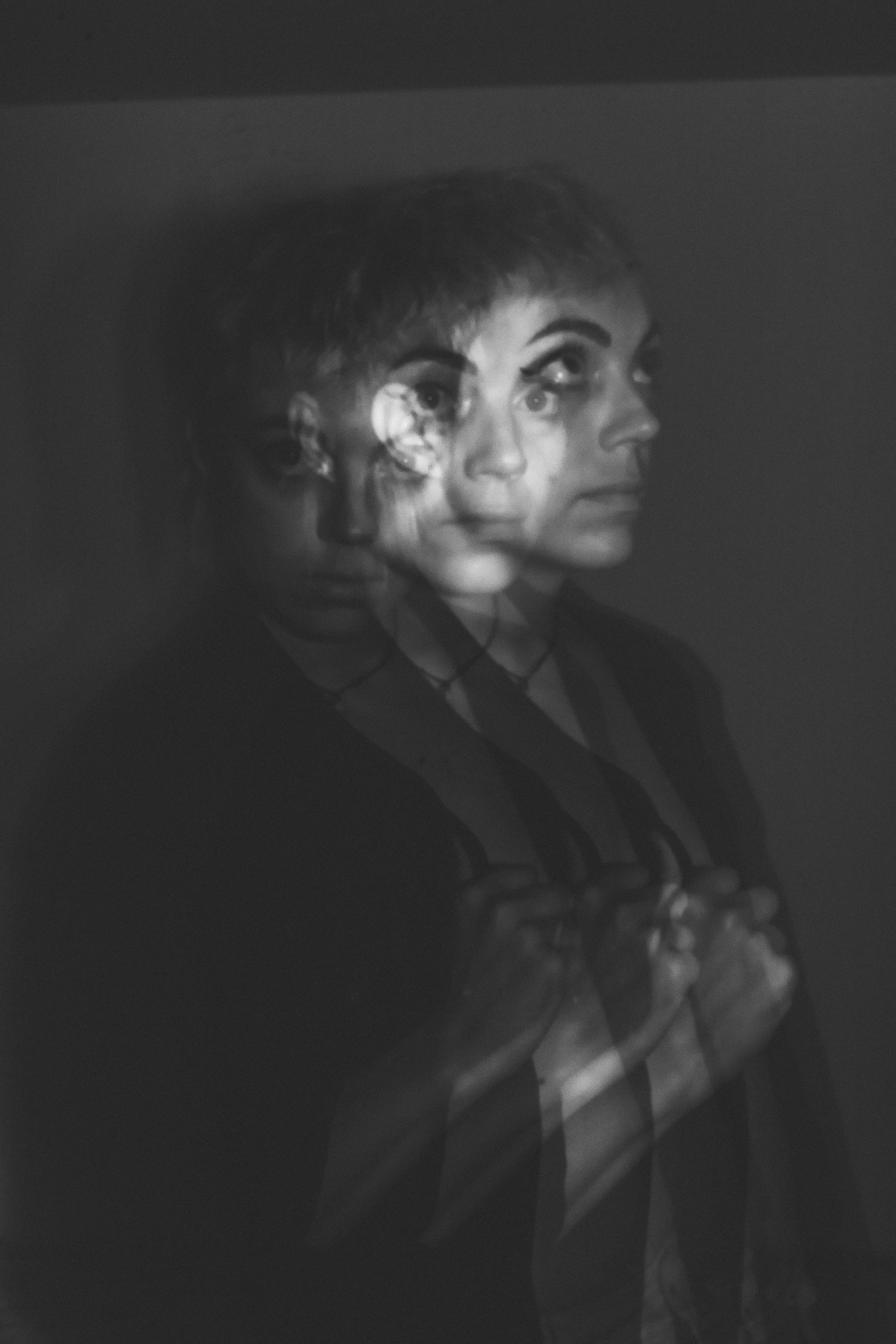 experimental photo of an artist in black and white