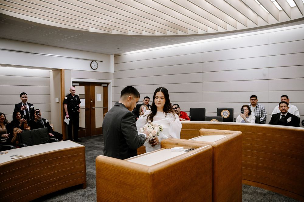 A series of courtroom interior photos showing wood-paneled walls and court proceedings in progress.