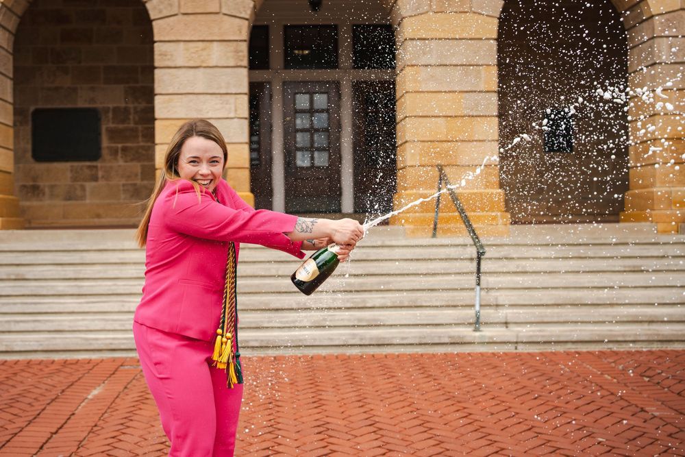 College grad, graduation, celebrate, University, UW, Madison, Wisconsin, Badgers, champaign