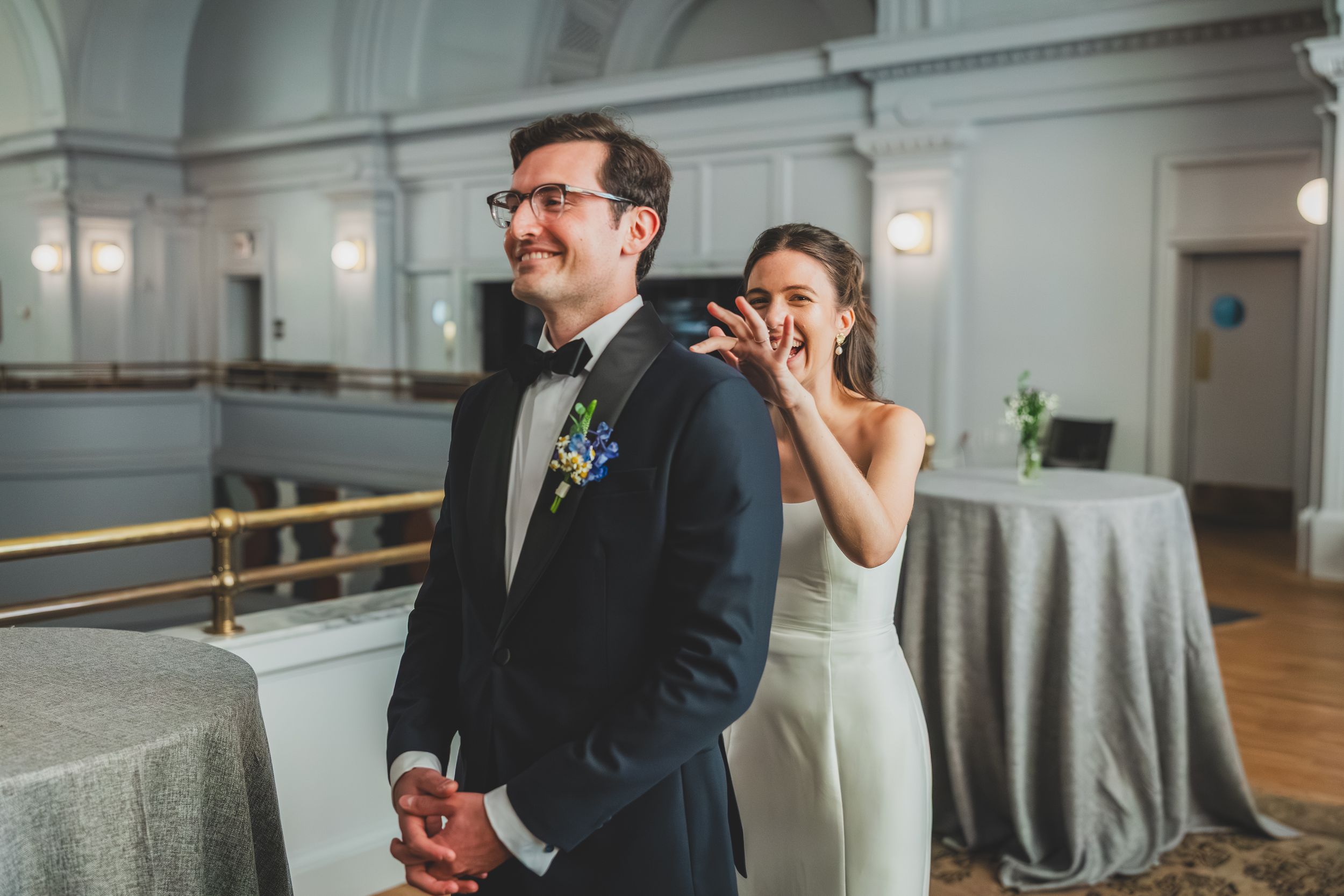 a first look photo of a bride and groom in the lobby of the line hotel in washington dc