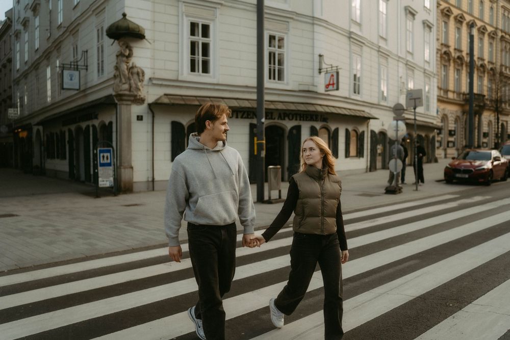 A series of street scenes showing people walking across a zebra crossing in an urban European setting.