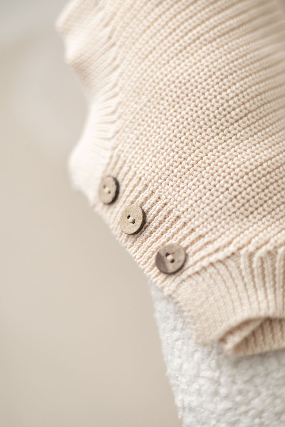 newborn session wardrobe Nottingham soft knitted cream baby outfit wooden buttons