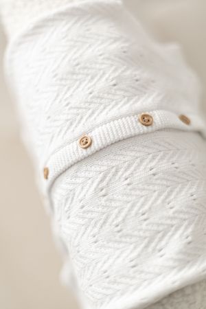 neutral all in one buttoned baby clothing Nottingham newborn photoshoot wardrobe