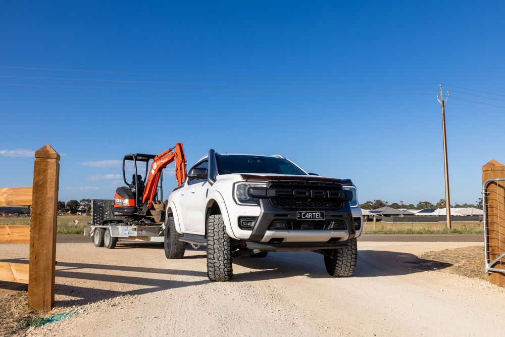 Ute towing mini excavator on trailer – Cartel Equipment Hire Murray Bridge