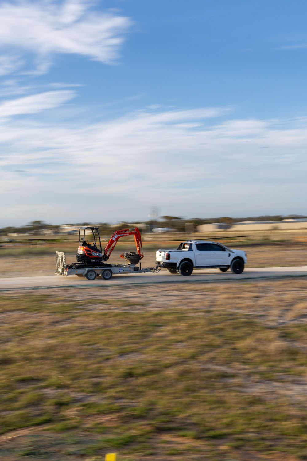 Mini excavator on trailer behind ute – Cartel Equipment Hire Murray Bridge