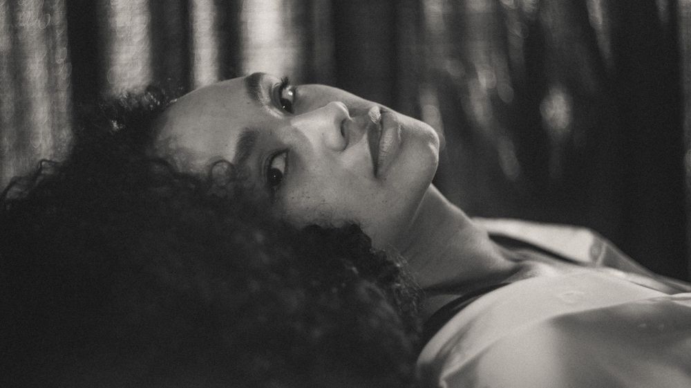 Dramatic black and white portrait sequence with contrasting shadows and highlights.