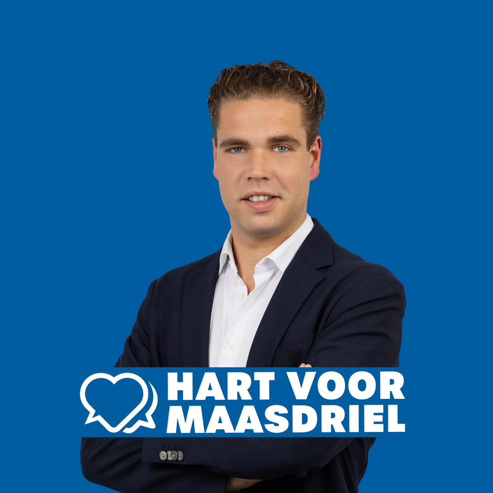 Young professional man in navy blazer poses confidently with arms crossed for Hart Voor Maasdriel political campaign on blue background.