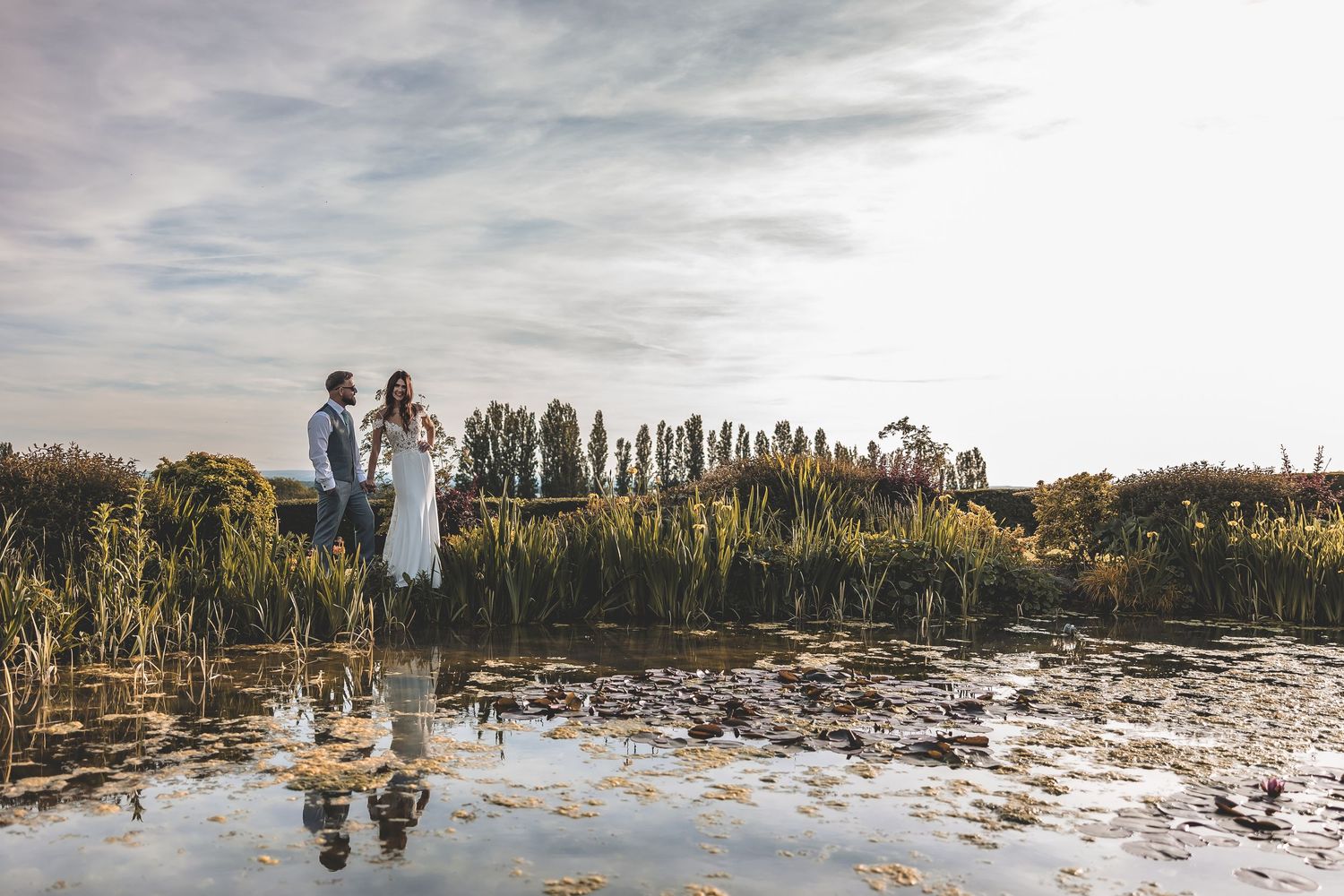 Intimate guided wedding moment at countryside venue.