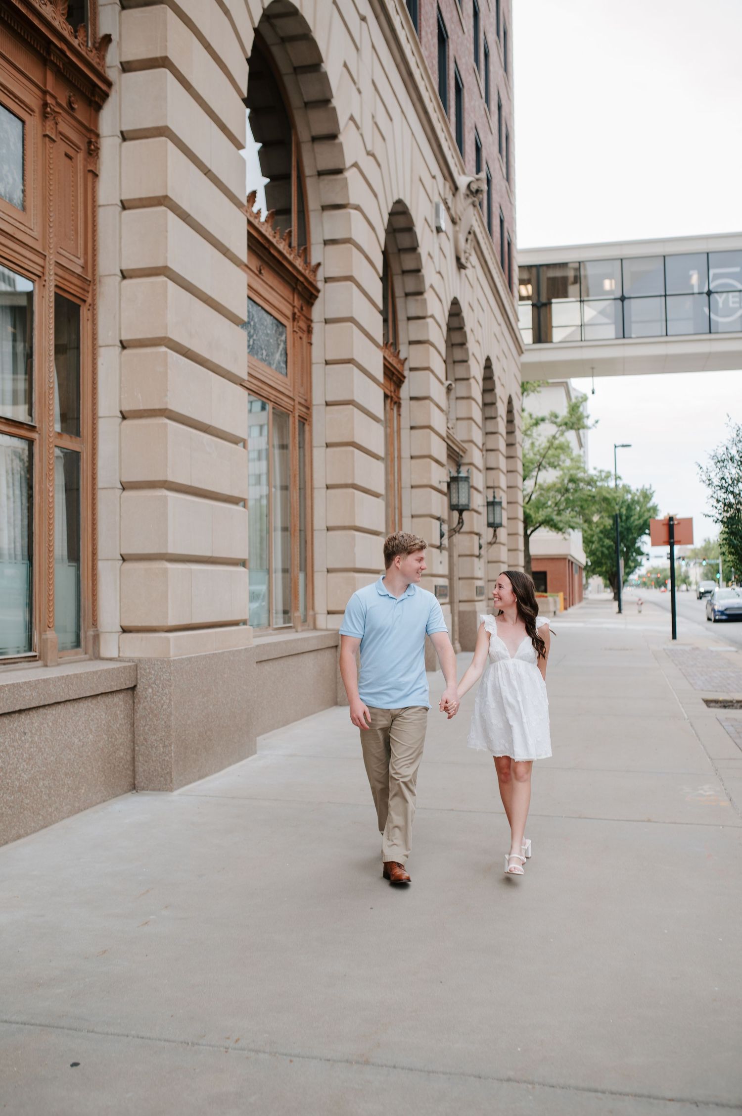 Downtown Wichita, KS engagement session by photographer Jessica Nadine Photography.  Classic architecture buildings city vibe national bank
